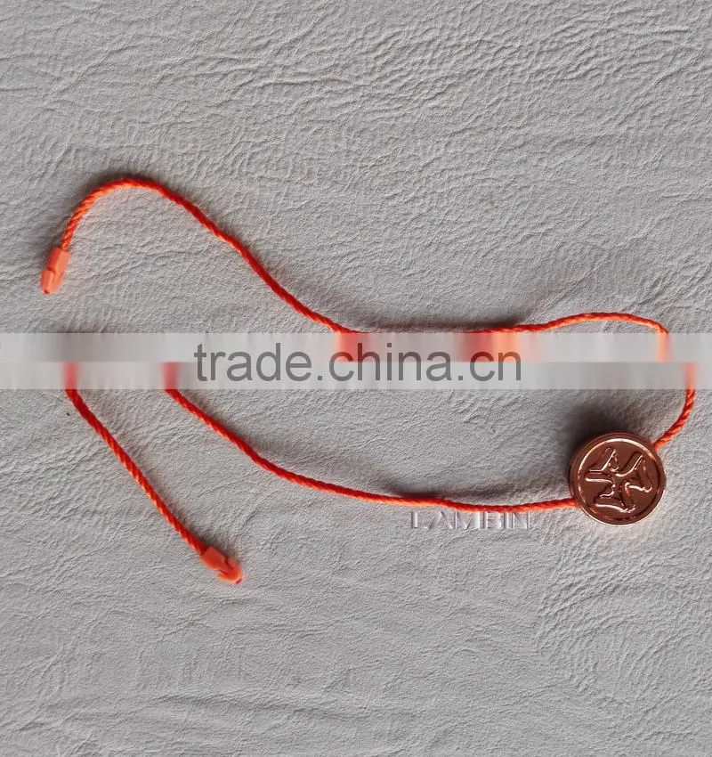 Gold string seal tag for working wear