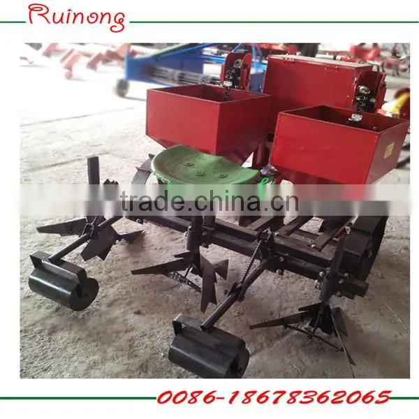 Three point mounted walking tractor matched cups potato planter