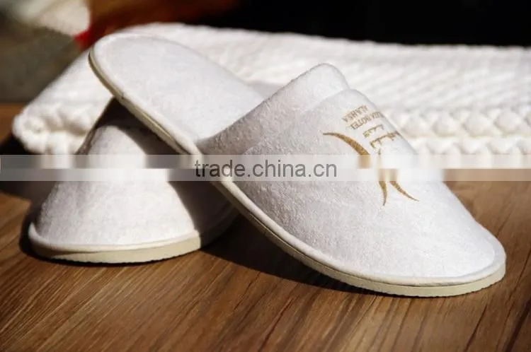 Disposable white nap cloth spa hotel slippers