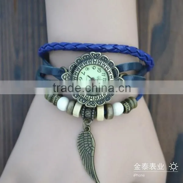 alibaba express Quartz watch F-05 for girls with Wing pendant,leather strap, bronzed watch case