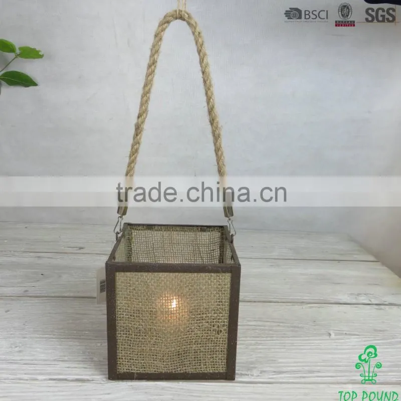 square glass and metal candle holder with jute cloth and rope
