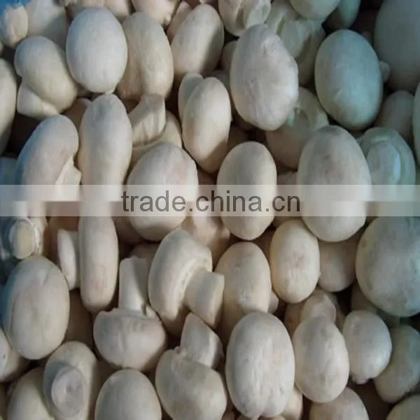 Frozen white champignon mushroom whole