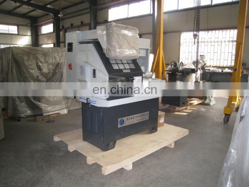 The small cnc lathe machine with chuck and tool turret CK0640A