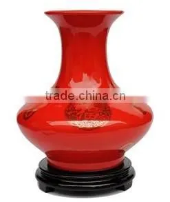 Antique decorative ceramic red vase