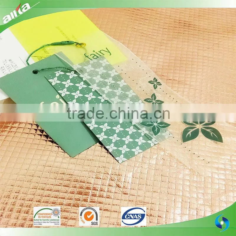 Customized garment paper tags with hang tag cord locking
