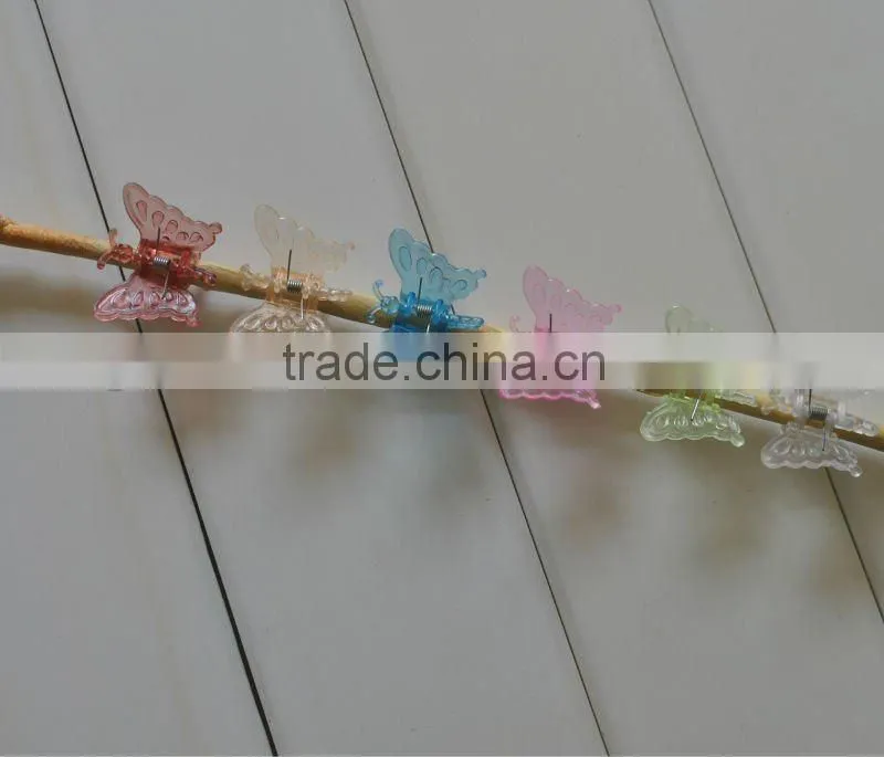 green butterfly plant support clip