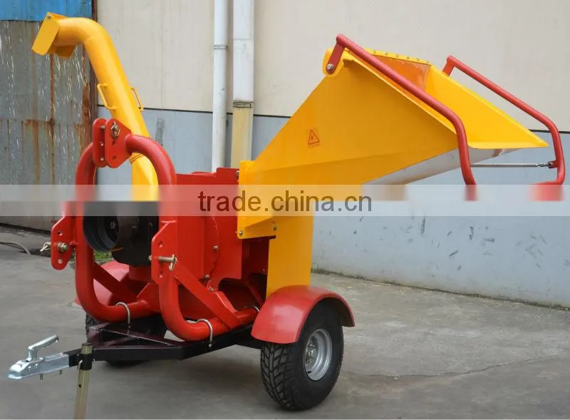 Hydraulic tractor pto trailer mounted self feeding wood chipper shredder