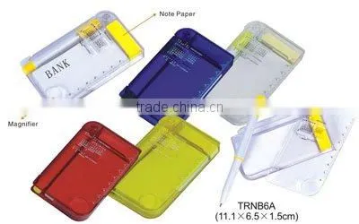 Multi-functional plastic notebook with calendar, ball pen and magnifier