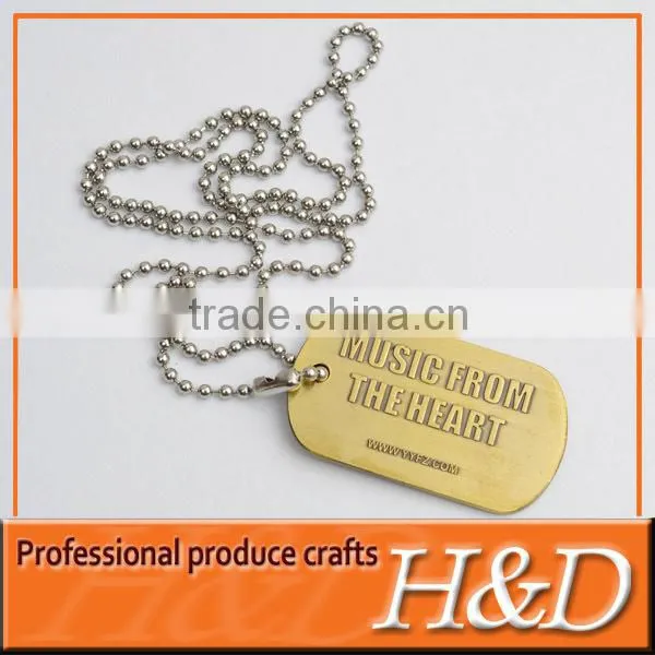 antique brass metal luggage tag with logo