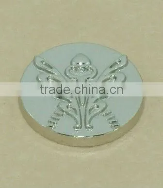 brass button with flower smile face