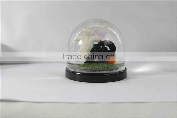 Plastic halloween ghost pumpkin snow globe
