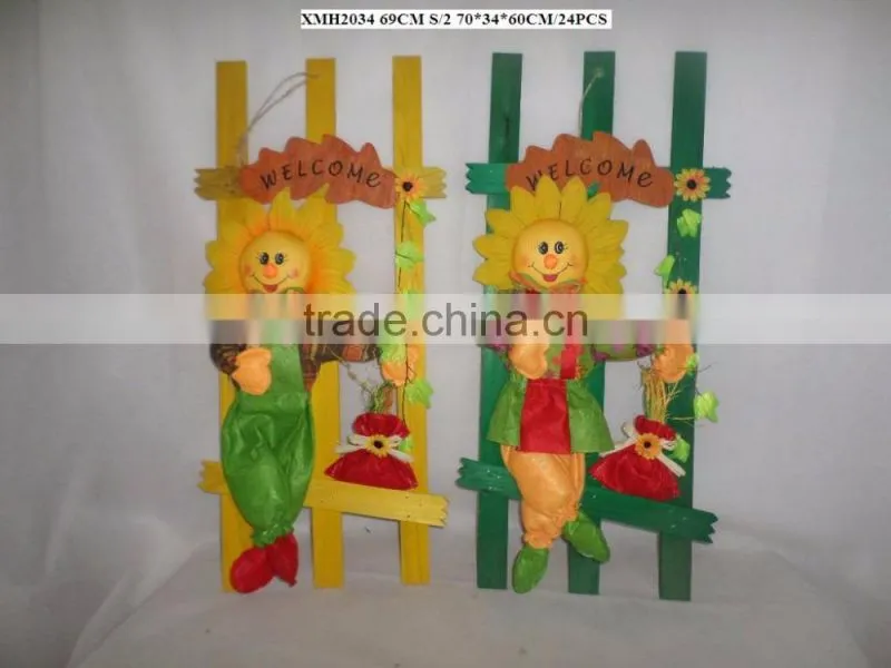 Straw and fabric scarecrow witch for halloween decoration