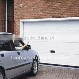 Automatic sectional garage door