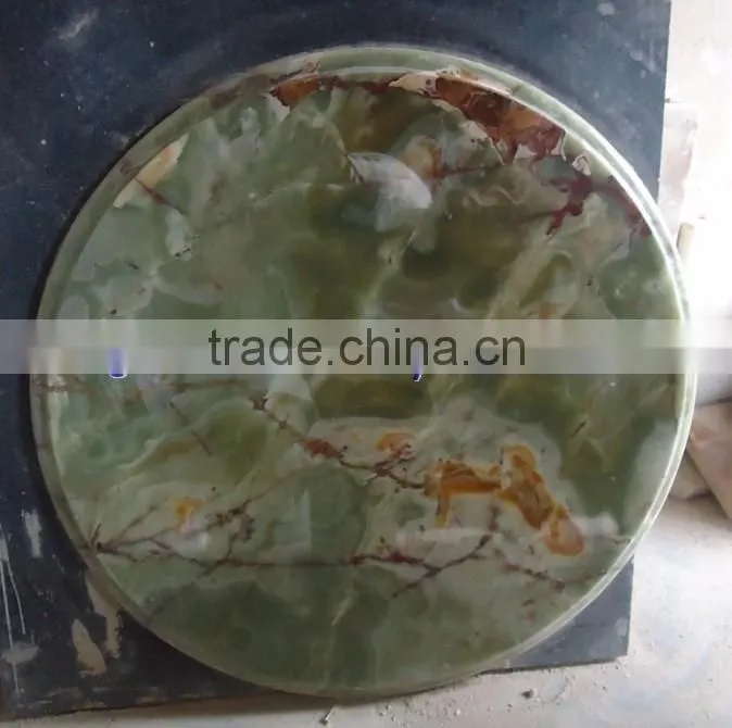 A GRADE DARK GREEN ONYX TABLE TOPS COLLECTION