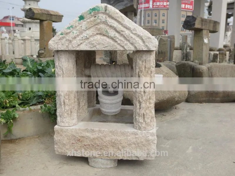 River stone fountain with litter boy statue for garden decoration
