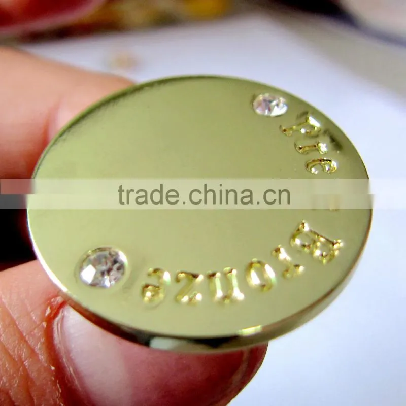 a crystal gold color jeans button