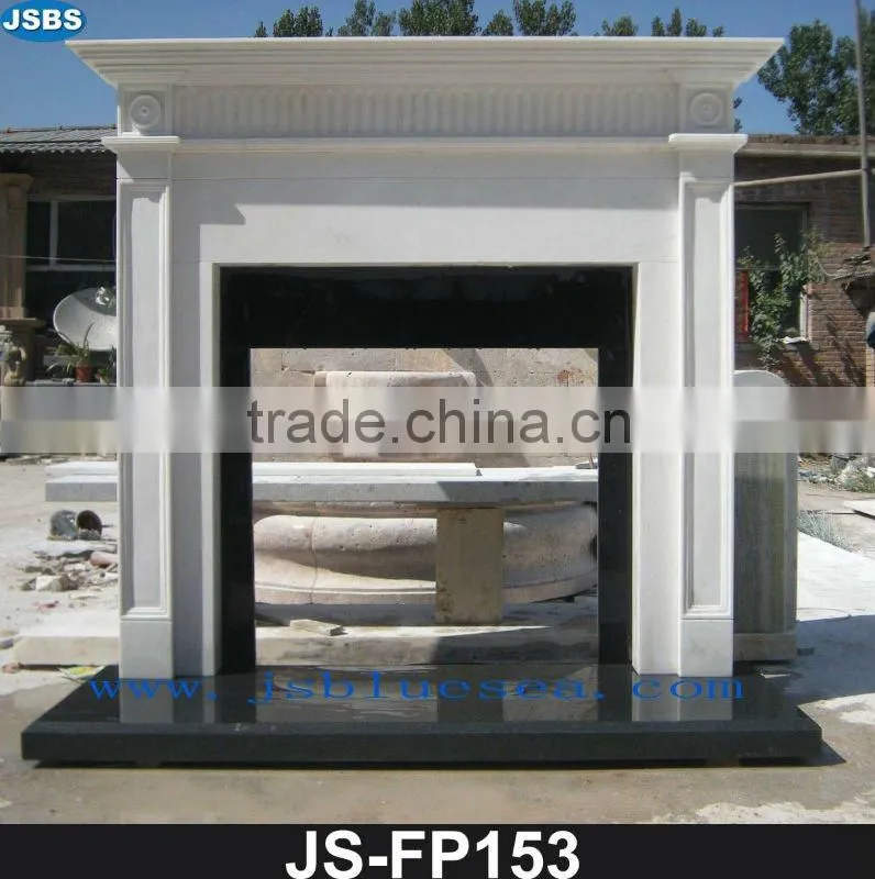 Carved white marble fireplace frame
