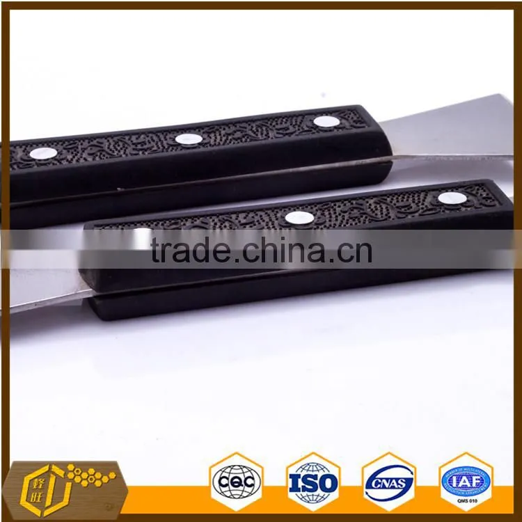 uncapping knife