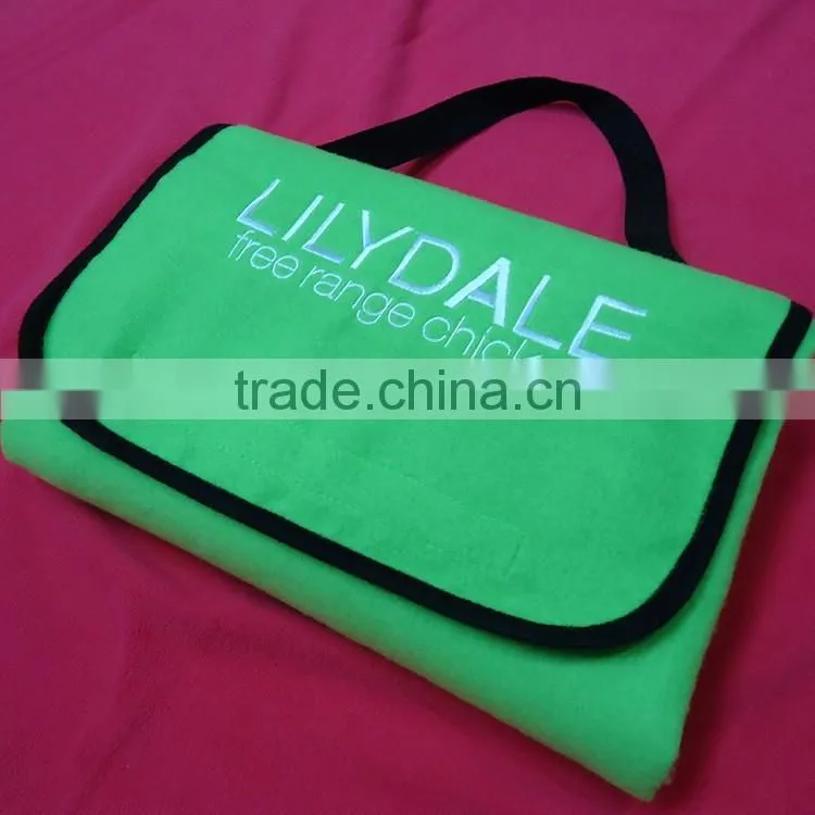 green color polar fleece with sponge & nylon back outdoor waterproof travel blanket