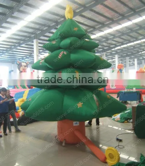 green snowing inflatable christmas tree