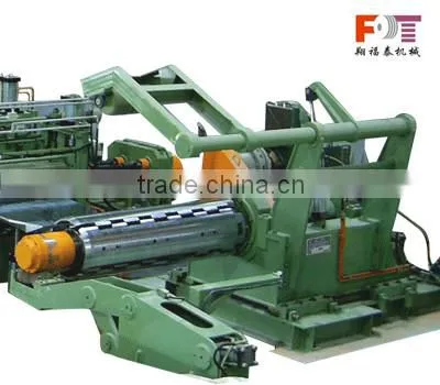 hydraulic coiler machine with hold down arms device