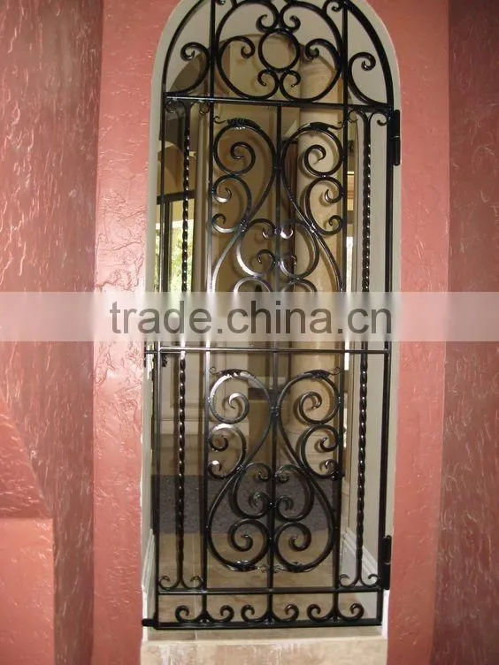 wrought iron cellar door with glass
