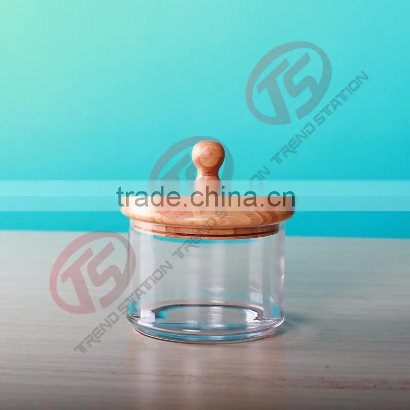 pillar glass jars and lids in wooden