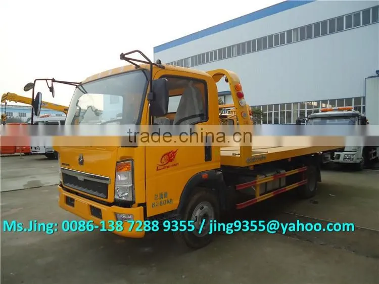 HOWO 3800mm wheelbase cheap wrecker tow truck, L5600*W2300 flatbed wrecker towing truck on sale in Africa