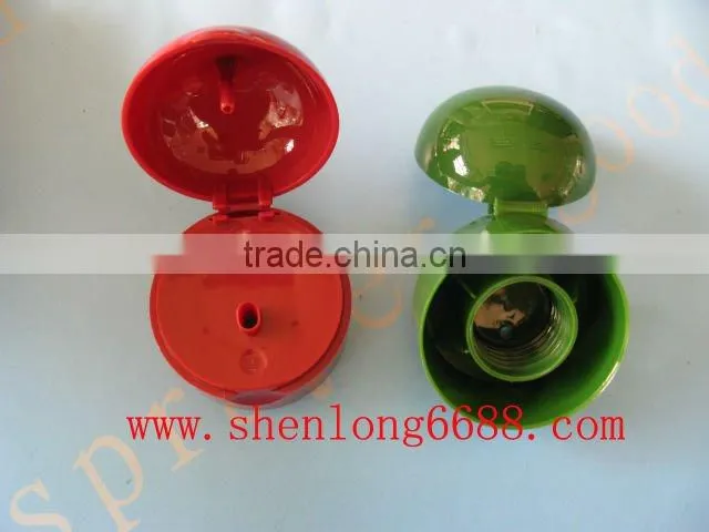 black plastic shampoo bottle flip top cap