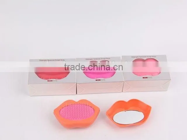 Lip shaped plastic massage comb with mirror/hair brush