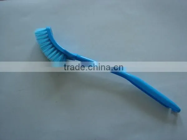 Colored brushes for floor cleaning