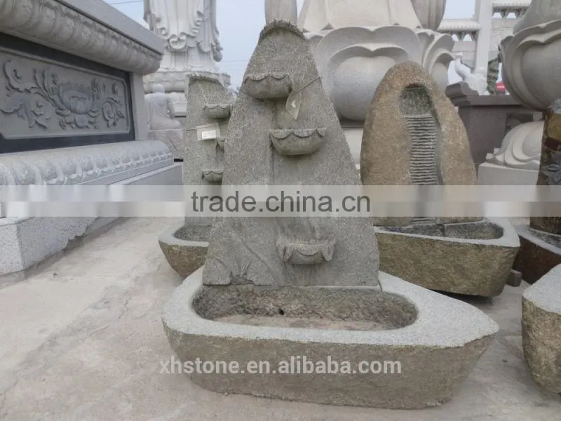 River stone fountain with litter boy statue for garden decoration