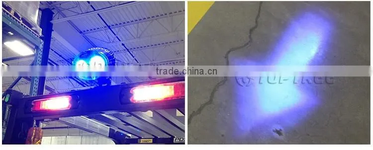 Forklift approaching blue warning light