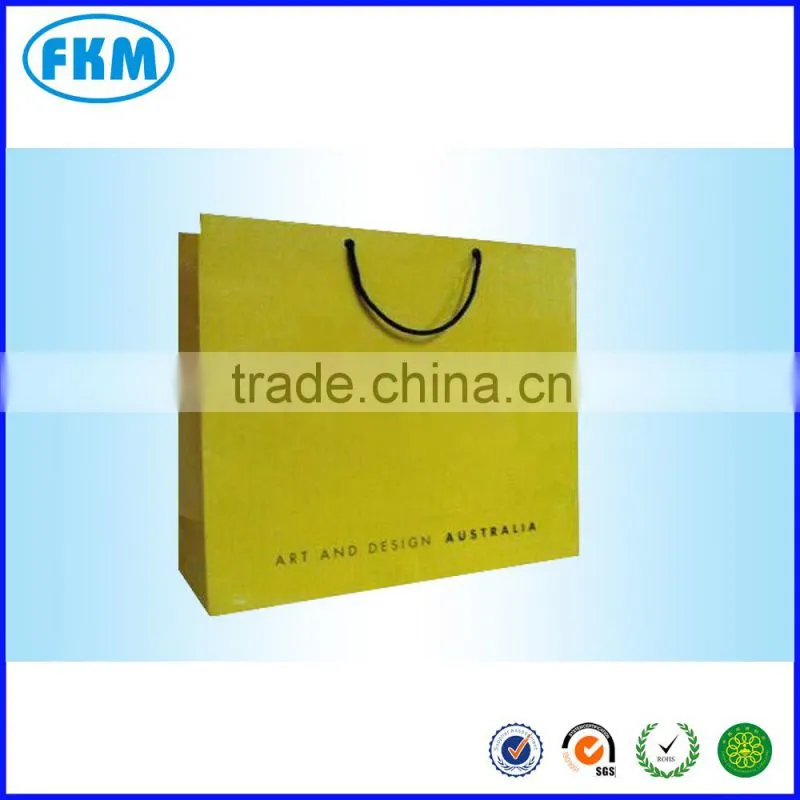 yellow handled paper bags