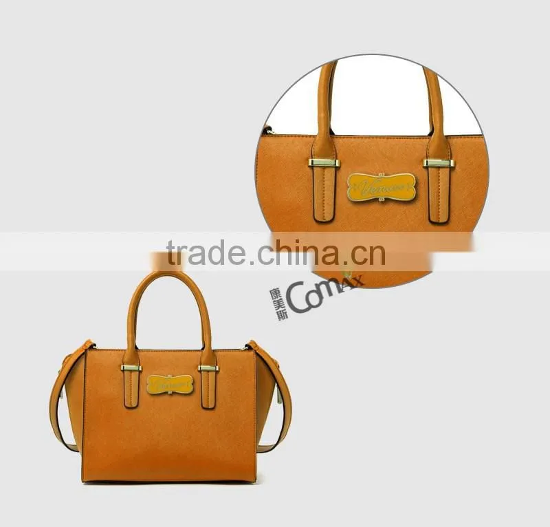 Different color filled custom fancy handbag metal logo