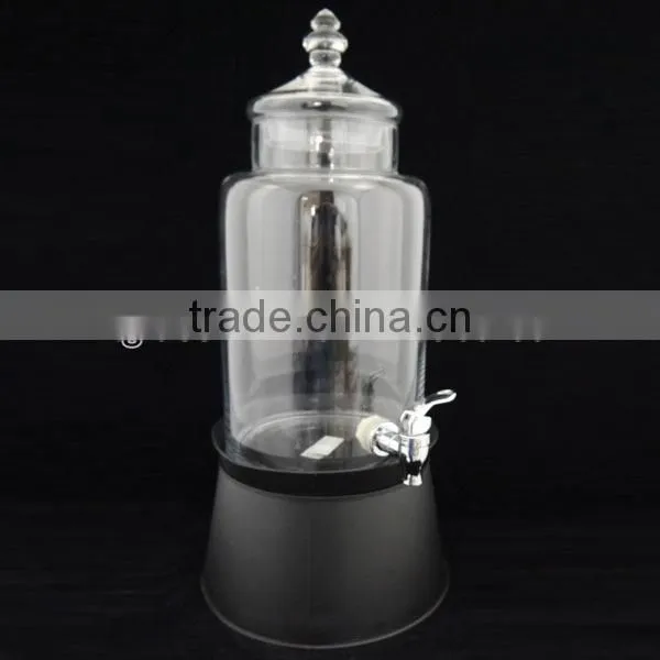 country style clear round juice dispenser with white metal ice bucket