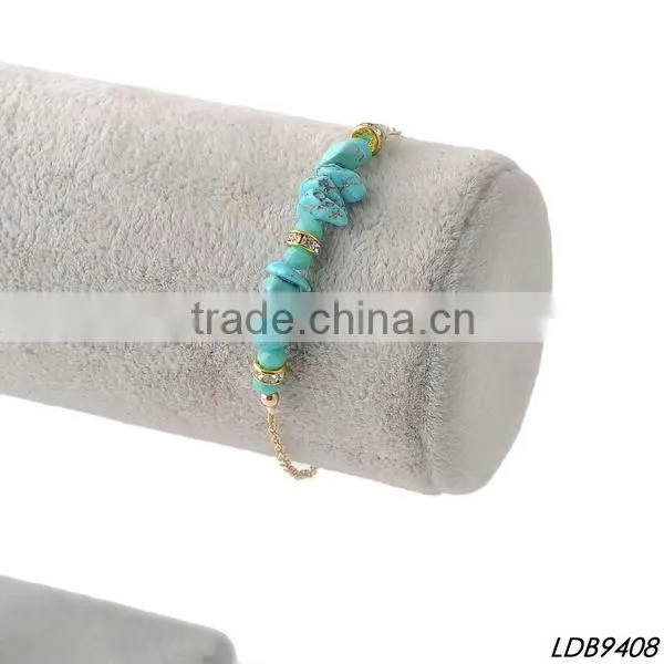 Antiquated cross with turquoise silver bangle cross bracelet