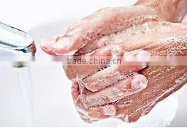 Clear plastic box of commercial liquid hand soap dispenser