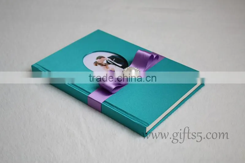 Unique wedding guest book with ribbon bow