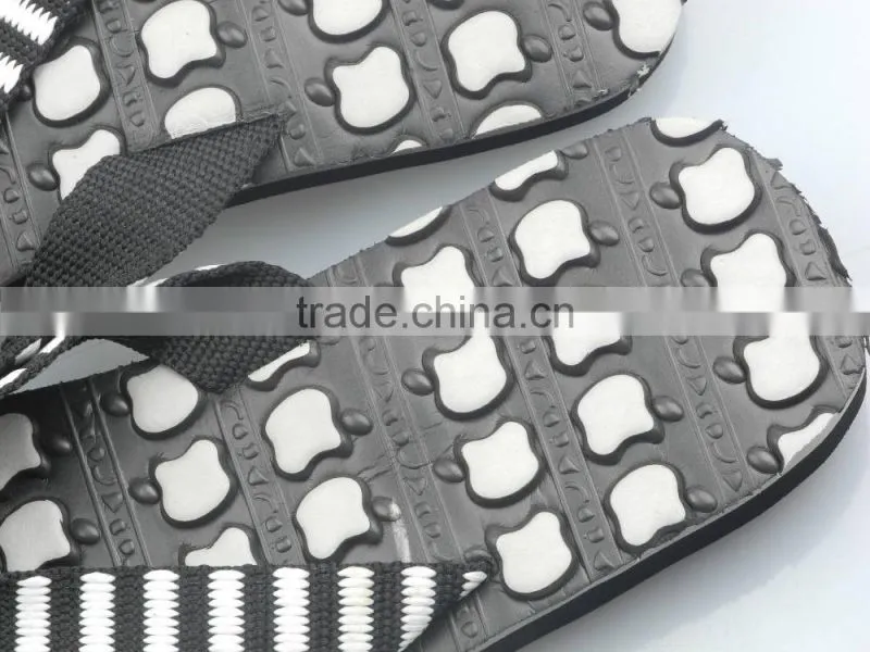 Men's black and white flip flops stock shoe