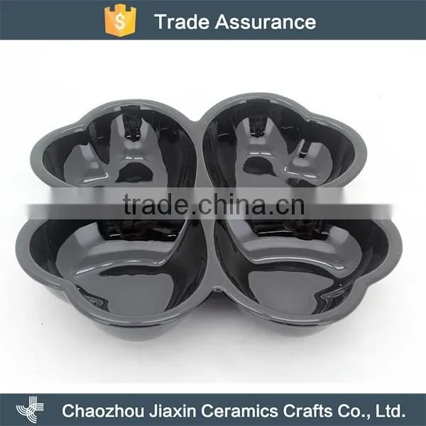 Cheap durable clover shaped black ceramic snack dish