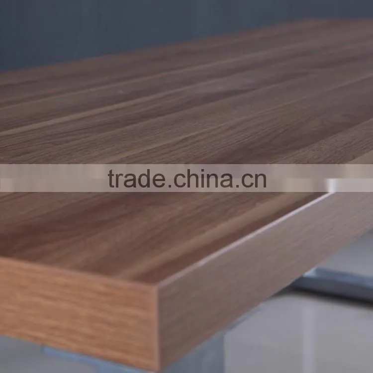 Long narrow stainless steel feet with wooden dining table