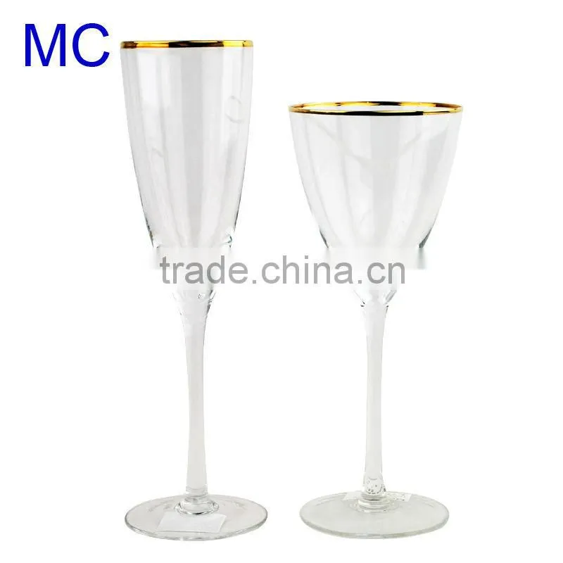 Fashionable champagne glass with gold rim