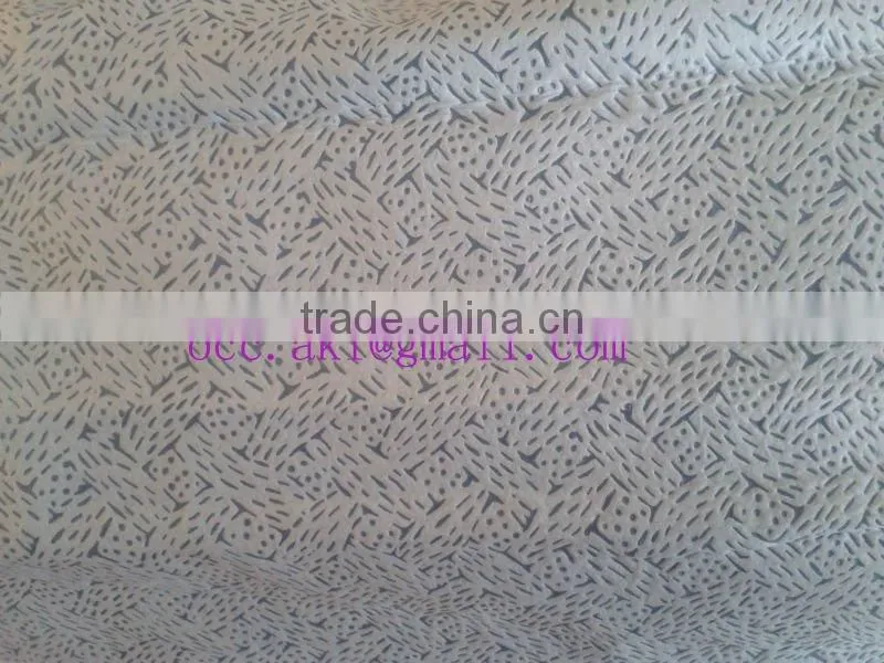 Heavy duty oil and solvent nonwoven wiper
