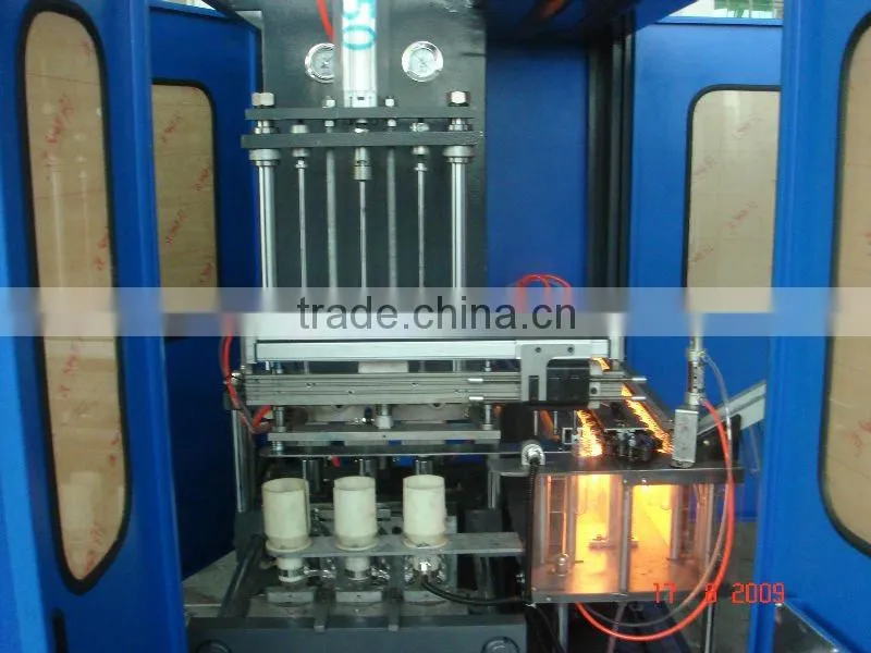 Automatic lineal type PET blow mould machine