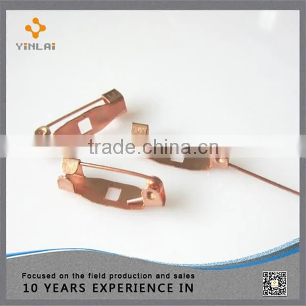 Small decorative metal safety pin