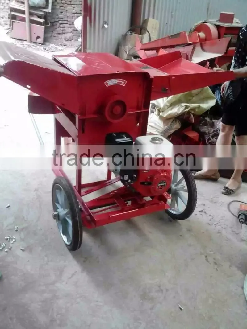 Movable mini paddy grain thresher