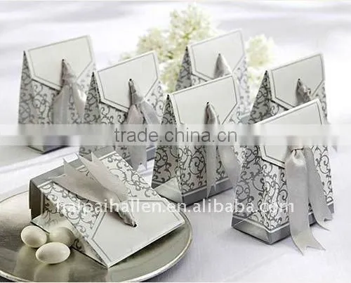 Candy boxes of miniature silver chair favor