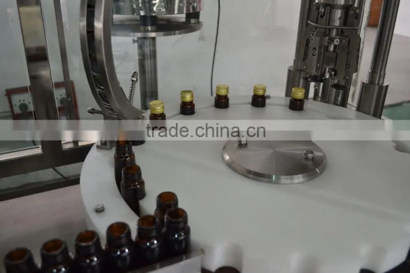 Automatic filling and capping machine