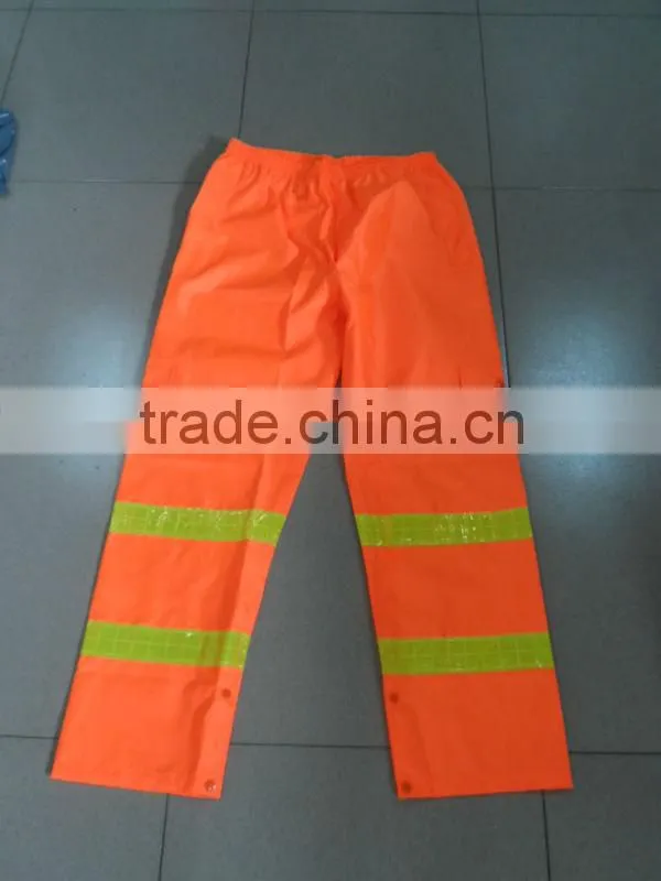 high visibility orange safety rainsuit with yellow plastic tapes